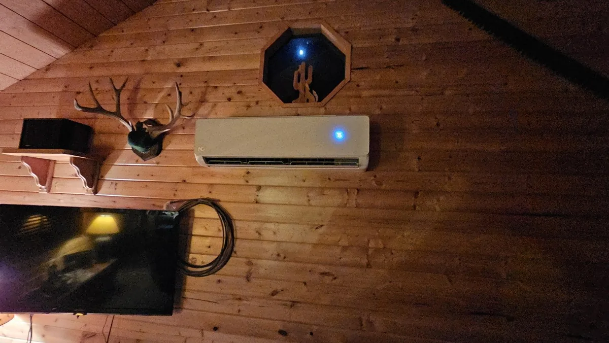 Ductless mini split installed in a wood cabin